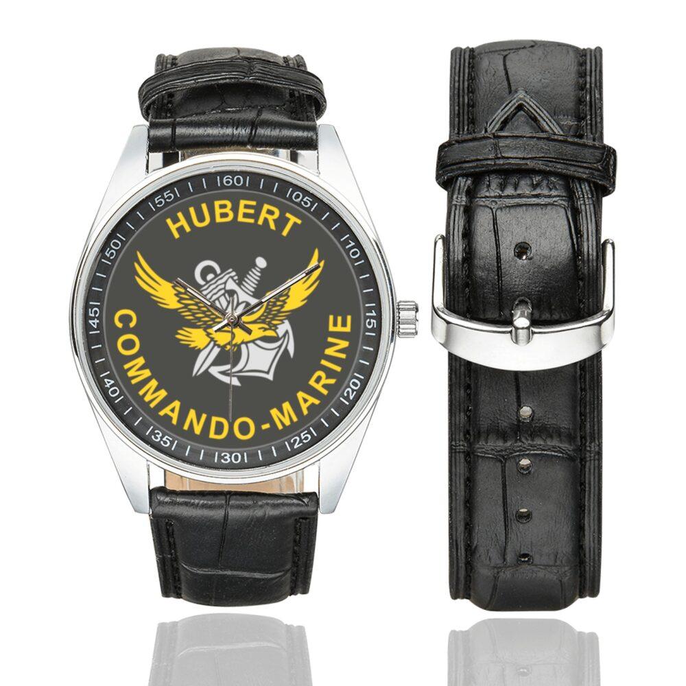 Men's casual watch with a round dial featuring the Commando Marine Hubert emblem, silver-tone case and black leather strap, shown with the strap to the side.