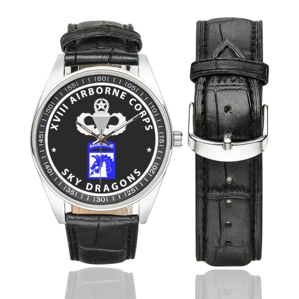 Men's casual watch with a round dial featuring the XVIII Airborne - Sky Dragons emblem, silver-tone case and black leather strap, shown with the strap to the side.