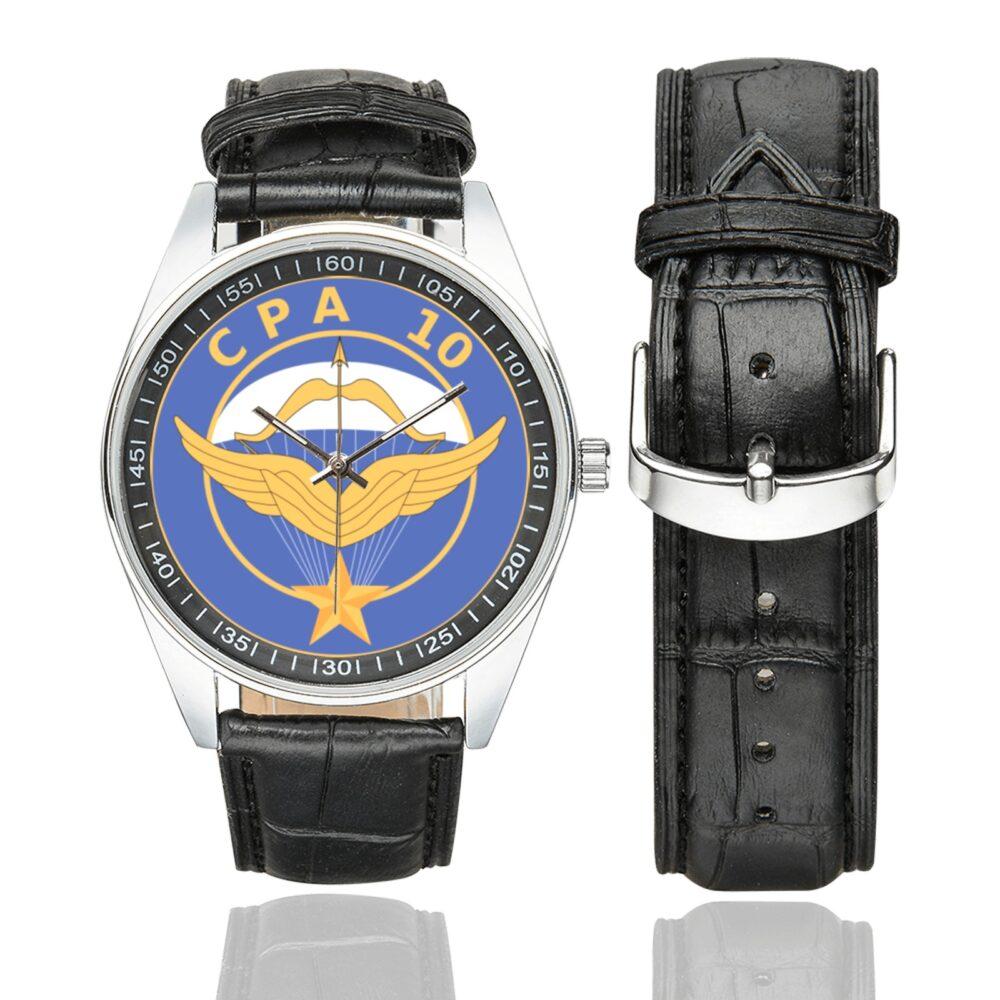 Men's casual watch with a round dial featuring the Commando Parachutiste de l'Air n° 10 emblem, silver-tone case and black leather strap, shown with the strap to the side.