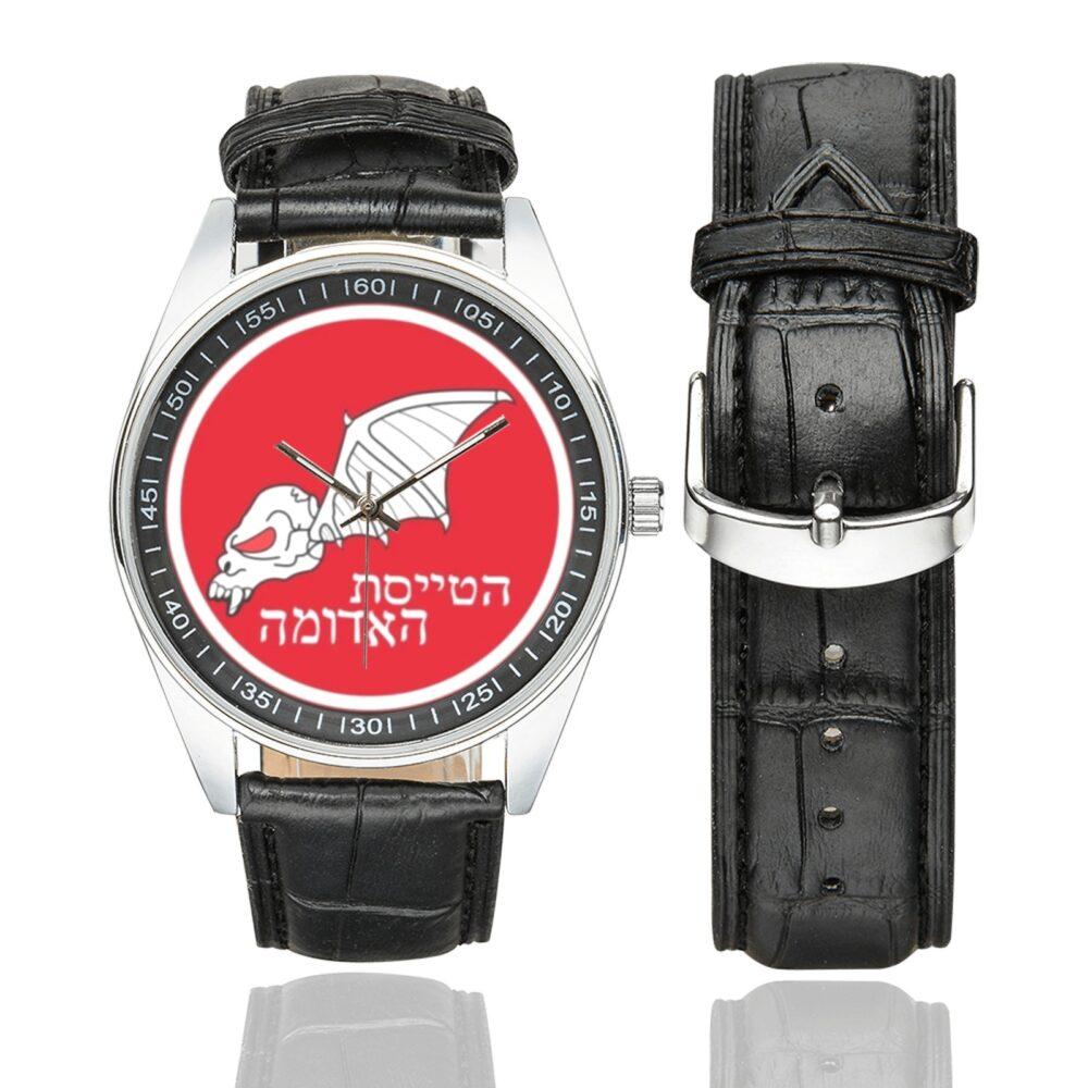 Men's casual watch with a round dial featuring the Israeli Air Force 115 Squadron emblem, silver-tone case and black leather strap, shown with the strap to the side.