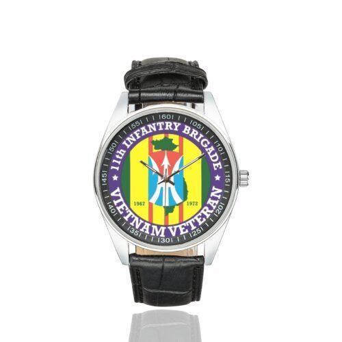 Men's casual watch with a round dial featuring the US Army 11th Infantry Division Vietnam Veteran- emblem, silver-tone case and black leather strap.