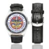 Men's casual watch with a round dial featuring the US Coast Guard Helicopter Rescue Swimmer emblem, silver-tone case and black leather strap, shown with the strap to the side.