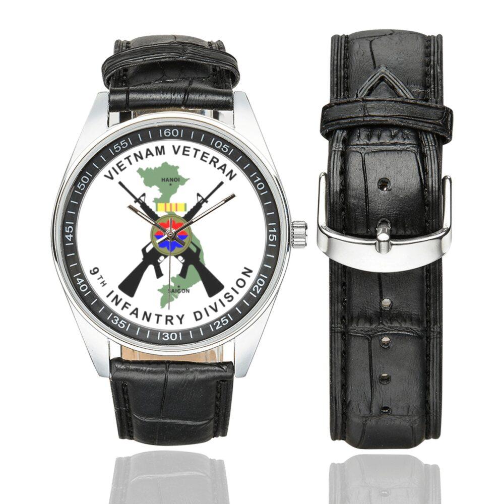 Men's casual watch with a round dial featuring the Vietnam Veteran 9th Infantry Division emblem, silver-tone case and black leather strap, shown with the strap to the side.