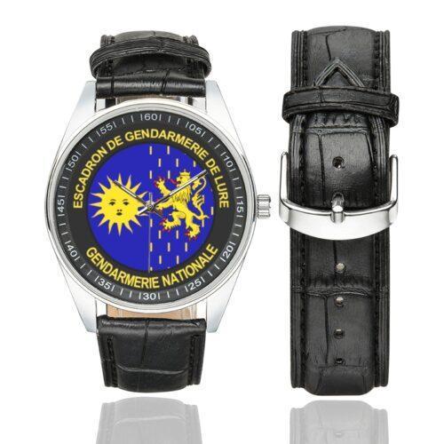 Men's casual watch with a round dial featuring the EGM 27-7 emblem, silver-tone case and black leather strap, shown with the strap to the side.