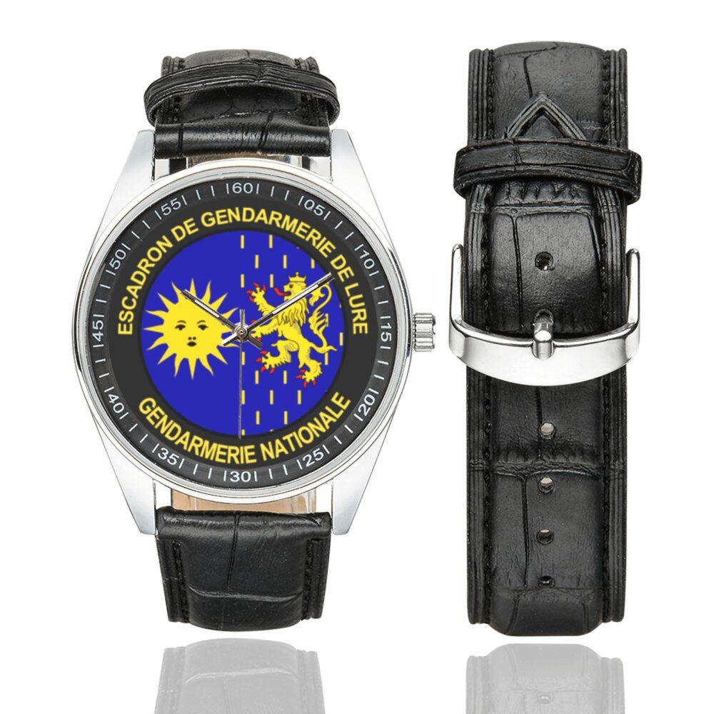 Men's casual watch with a round dial featuring the EGM 27-7 emblem, silver-tone case and black leather strap, shown with the strap to the side.