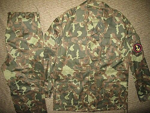Flat-laid Soviet three-colour camouflage uniform jacket and trousers in the Butan/Dubok woodland style.