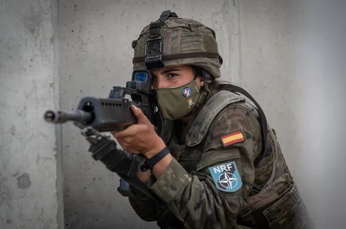 Spanish soldier with a G-36C rifle wearing M09 boscoso camouflage, NATO exercise in Romania, 2021