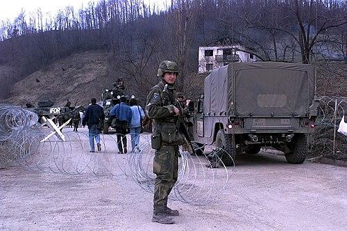 Swedish soldier in M90 camouflage on guard duty during the 1996 Bosnia peacekeeping mission