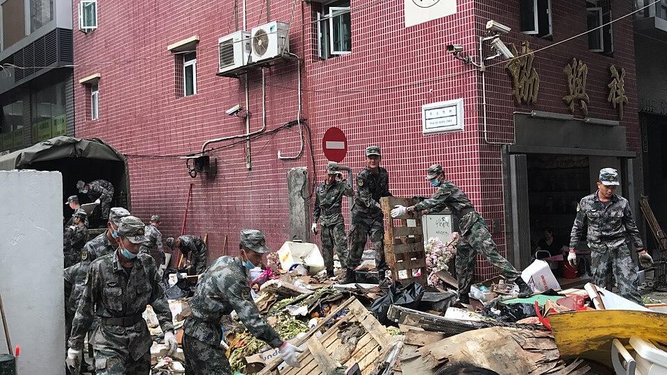 PLA soldiers in Type 07 digital camouflage assisting debris clearance in Macau after Typhoon Hato, 2017.