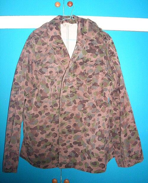 An Austrian Bundesheer camouflage parka jacket (Kampfanzug M57) in the Erbsentarn pea pattern, used from 1957 to 1978.