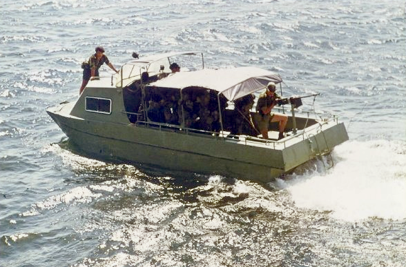 Rhodesian African Rifles and BSAP personnel aboard the patrol boat Sea Lion on Lake Kariba, December 1976