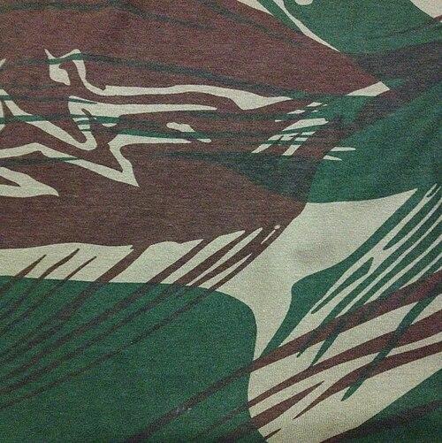 Swatch of the Rhodesian Brushstroke camouflage pattern with brown and green brushstrokes