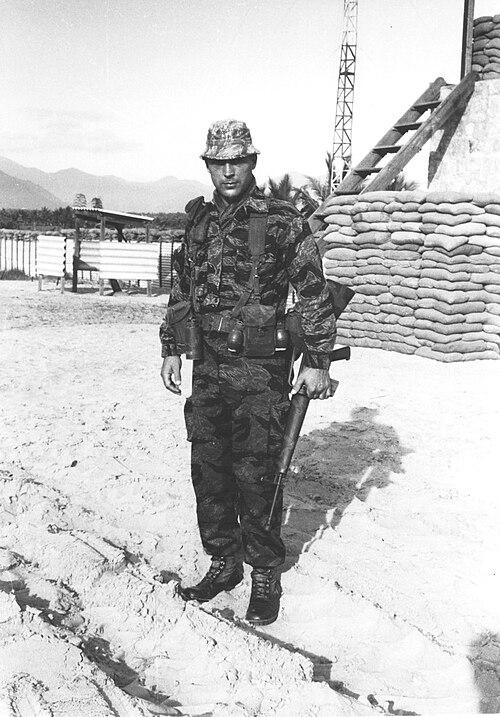 US Special Forces soldier in tiger stripe camouflage in Vietnam, 1966