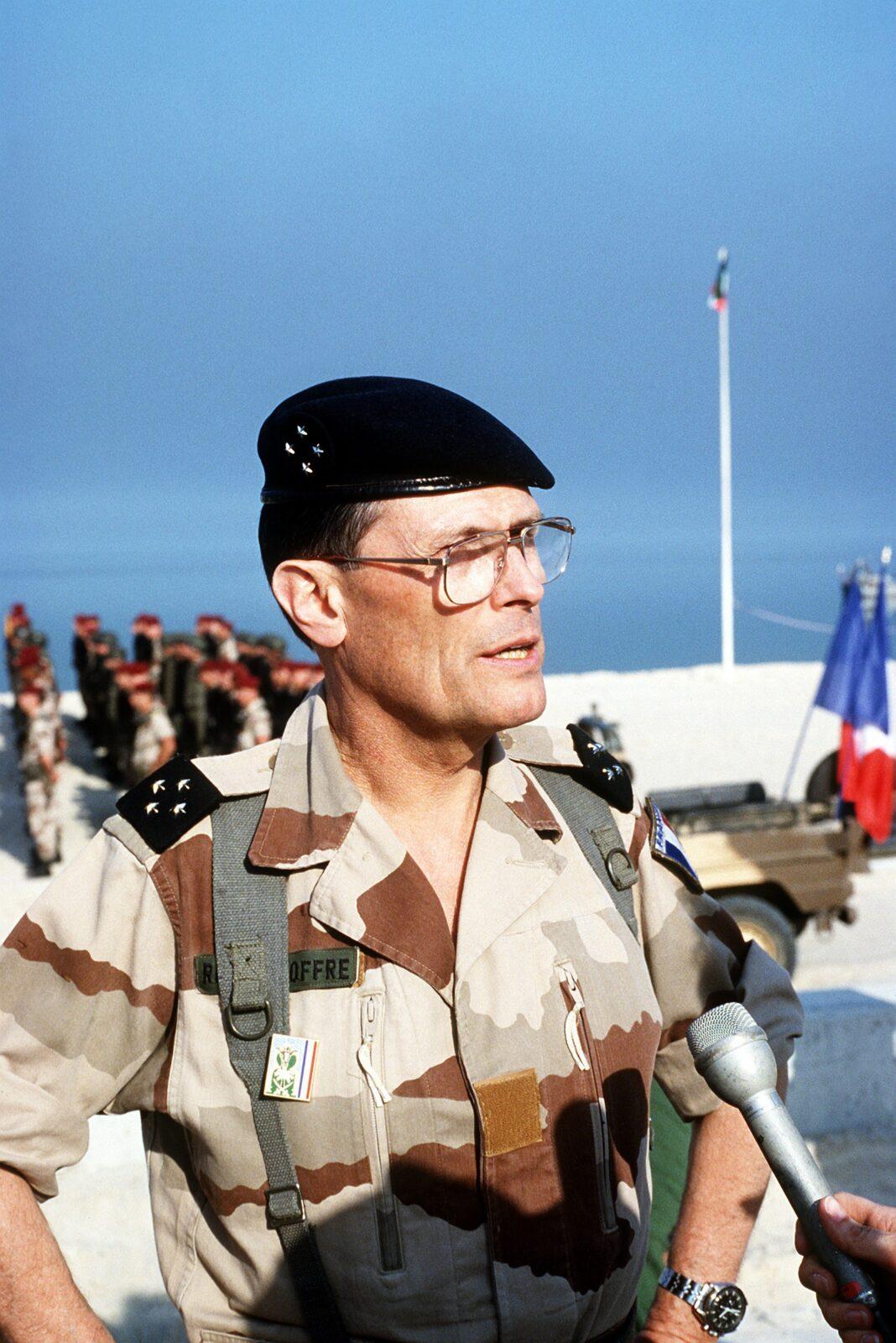 Close view of a French general in a desert camouflage jacket with wide horizontal brown bands, Kuwait City, 30 March 1991