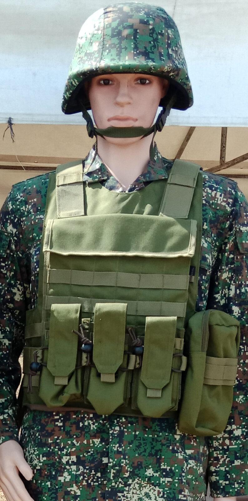 A single uniform shown on a display mannequin: a Philippine Marine Corps battle dress uniform in green square-block digital camouflage with an olive plate carrier.