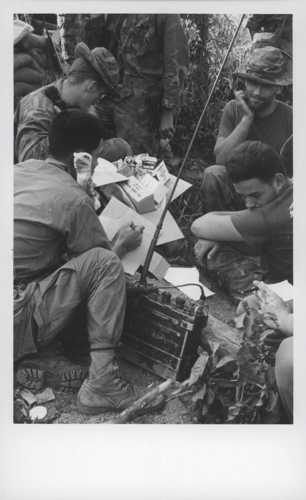 US Marines in ERDL camouflage transmitting tactical information by radio in Vietnam, 1969