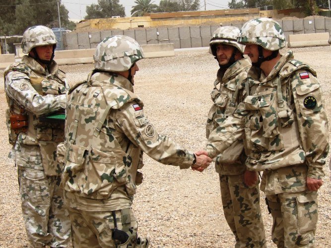 A Polish soldier in the desert PL Desert variant of wz. 93 Pantera during the deployment in Iraq