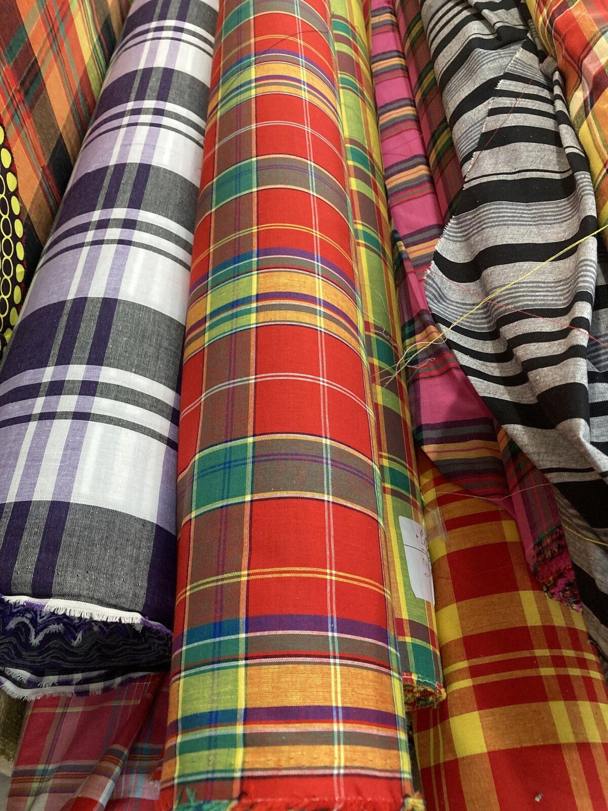 Rolls of printed cloth stacked together