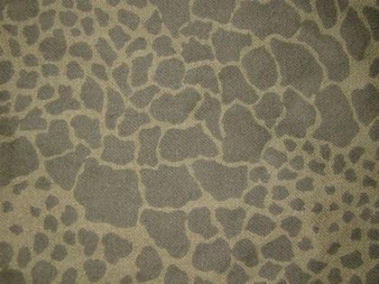 Reduced reference swatch of the Polish wz. 89 Puma pattern showing elongated dark olive-green blotches on a pale green field