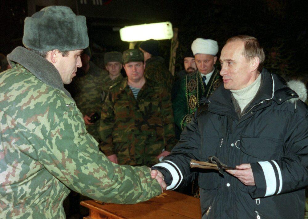 Acting Russian President Vladimir Putin presenting state awards to federal forces personnel in Gudermes, Chechnya, January 2000.