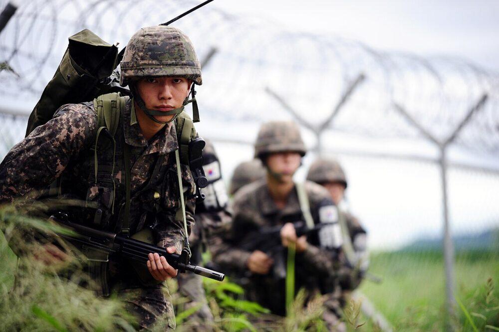 Republic of Korea Army soldier in digital granite camouflage uniform with rifle at a general outpost position, 2014