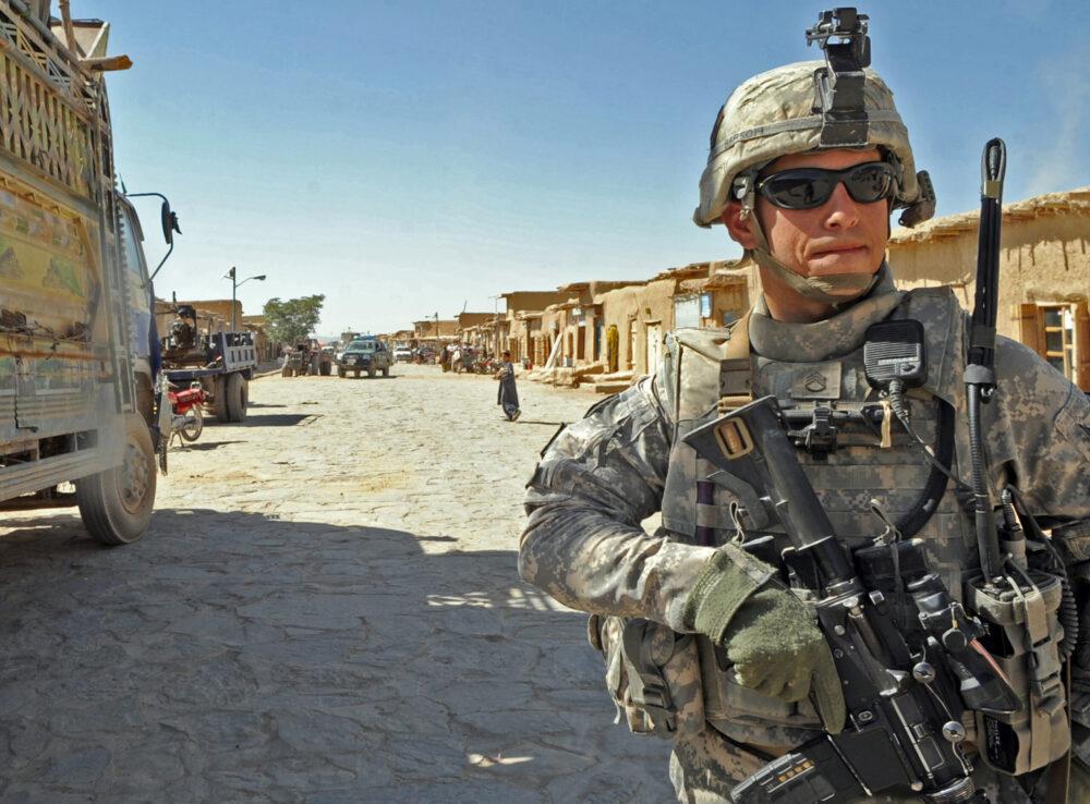 Close view of a U.S. soldier wearing pixelated UCP uniform and body armour in Afghanistan, 2009