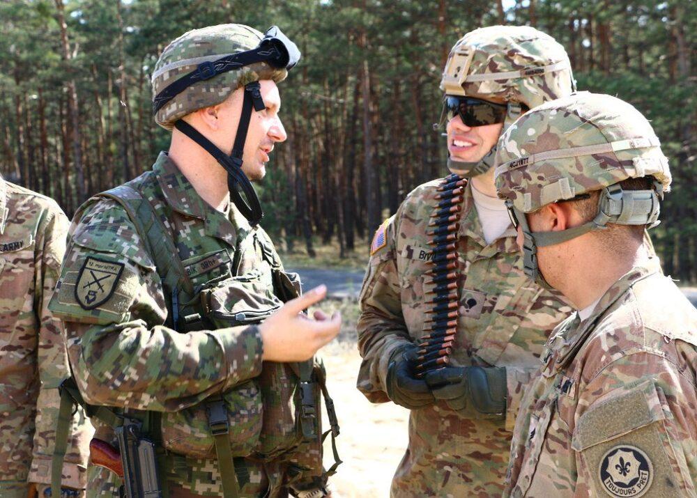 Slovak Armed Forces digital camouflage: Slovak and US soldiers working together