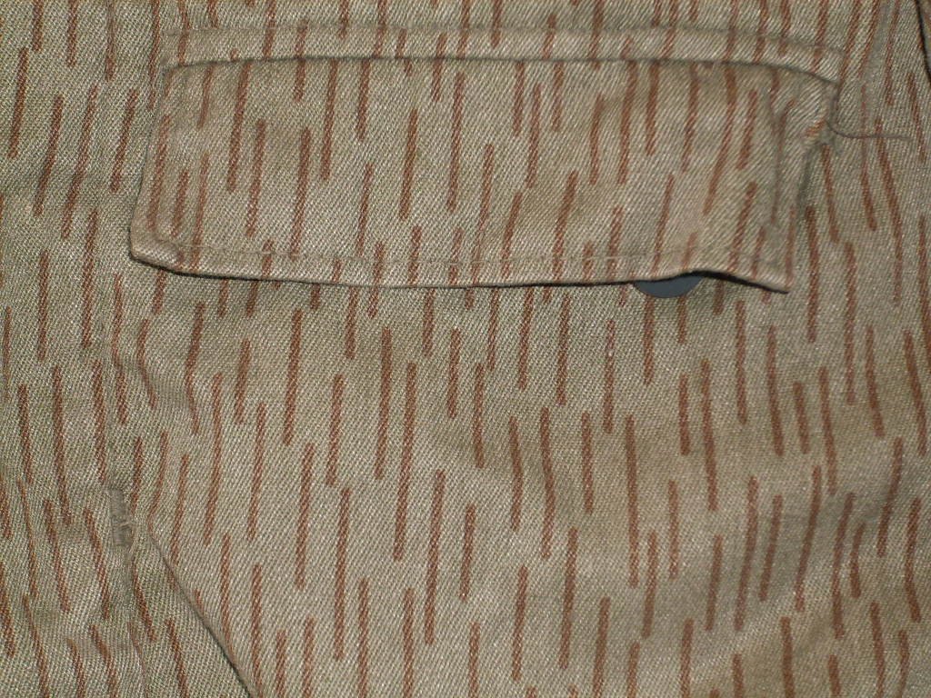 Strichtarn (model 1964) on an East German garment, 1965