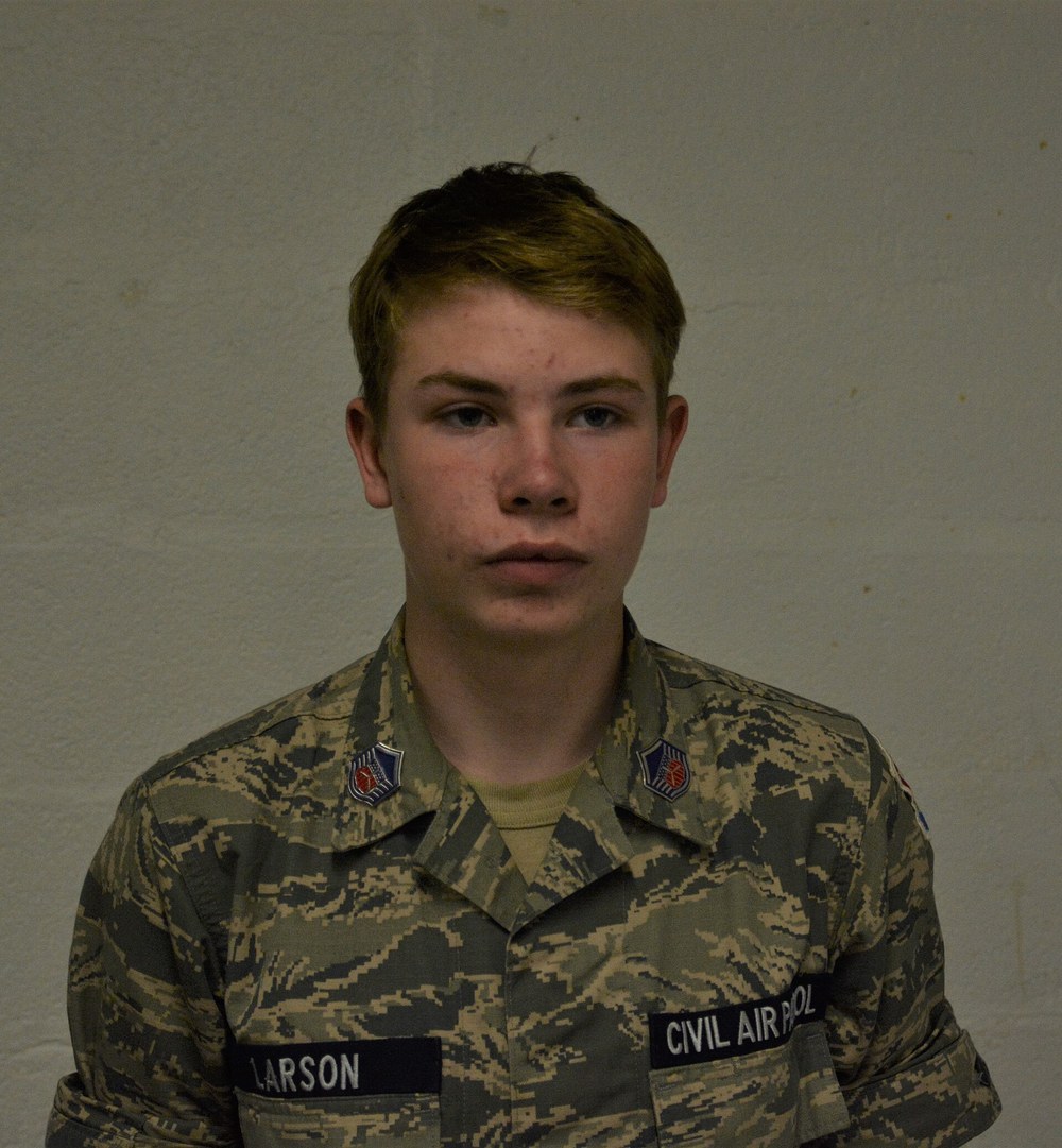A Civil Air Patrol cadet in an Airman Battle Uniform marked with Civil Air Patrol name tapes and shoulder patches.